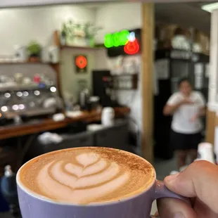 Morning cup of coffee topped with cinnamon and our baristas latte art
