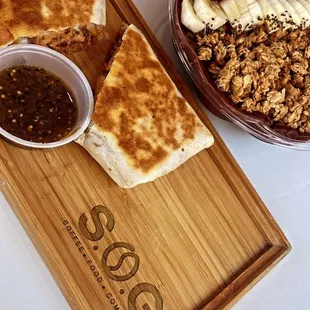 Chorizo breakfast burrito and Acai bowl