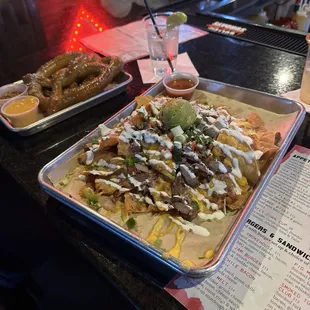 Vodka sprite, pretzels and brisket nachos.