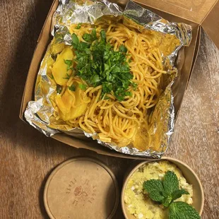 Macaroni (Persian-Style Bolognese) and Salad Olovieh (Egg and Potato Salad)