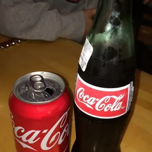 Can of coke + bottle of coke.