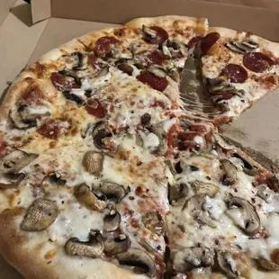 Pepperoni and mushroom pizza