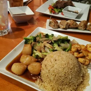 Shrimp and scallop teppanyaki and accident filet mignon dinner. Beef gyoza in the middle (very good)