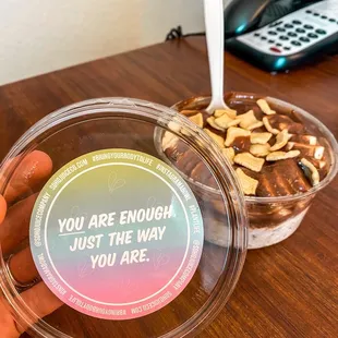 Pick 2 Bowl: almond joy overnight oats, banana, Notella drizzle, cinnamon keto crunch.