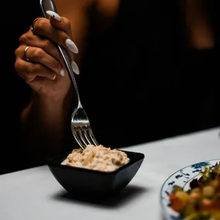 a woman eating a meal