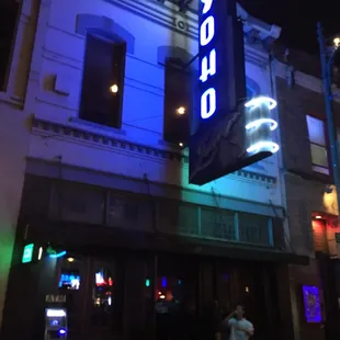 the neon sign for the restaurant