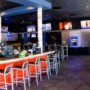 Renovated Interior Bar with juke box TV's, darts, and high top tables at SoHo Saloon, South Tampa