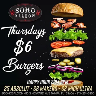 a burger being made into a tower