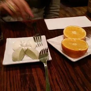 Mochi icecream (green tea and vanilla), complimentary orange