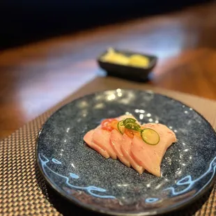 a plate of sushi on a table