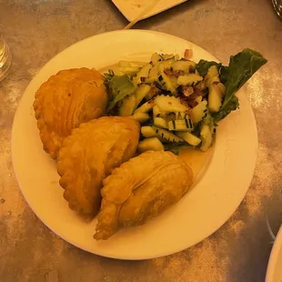 Curry puffs with cucumber salad