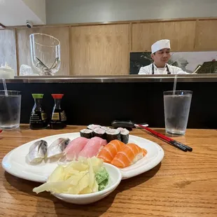 Saba, hamachi, salmon nigiri, 1 hamachi and scallion maki and sushi chef