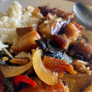 The eggplant and mushroom pork belly stir fry with rice I ate so much already and still so much pork belly left