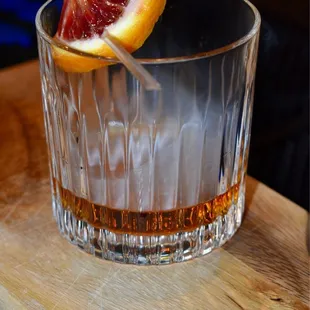 Bartender and Mixologist Damion at Soirée Cafe, serving smoked old fashioned. Photo By: https://www.Instagram.com/xrizztina