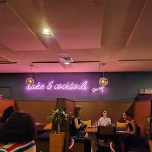 a group of people sitting at a table