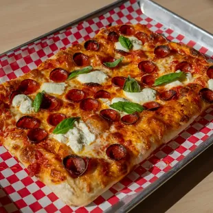 The Sojourner Roman-style Pizza Cup &amp; char pepperoni, AR's hot honey, basil, and ricotta