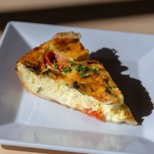Brunch Menu: Quiche by the slice, served warm
House made pie crust
* Tomato basil mozzarella
* Sausage cheddar arugula