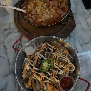 Korean Style Spicy Sausage Stew (Top) &amp; Bulgogi and Cheese Fries (Bottom)