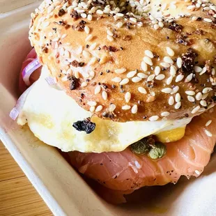 LOX everything bagel / red onion / chive cream cheese dill / caper (added an egg and pickled onion)