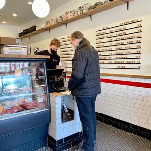 a woman serving a customer