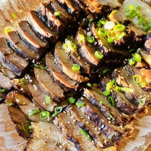 sliced pork with green onions