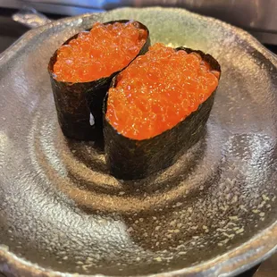 Ikura? Salmon roe sushi.  First time trying and liked it.