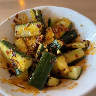 Cucumber salad, comes with crispy garlic chili oil- which I think is made in house