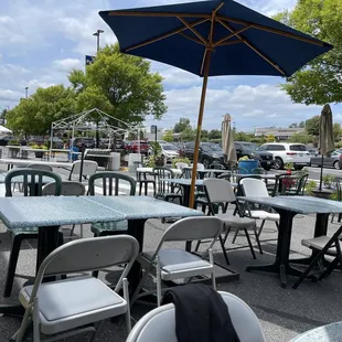 tables and chairs in a parking lot