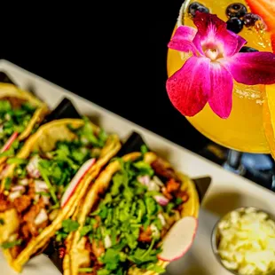 Get ready to spice up your day with some delicious tacos and refreshing margaritas!