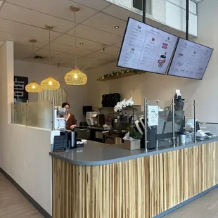 a woman sitting at the counter