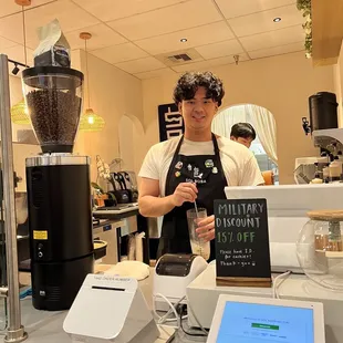 Nice young man making our drinks!