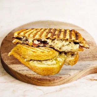 Green Chile Chicken Panini with bacon added to it