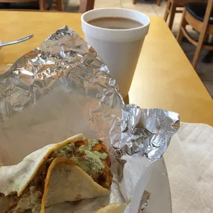 Chorizo with potatoes taco and coffee