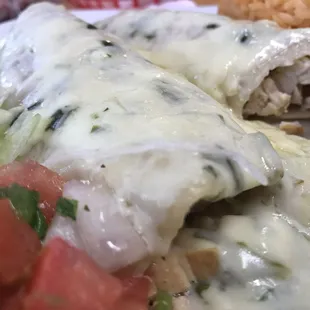 Special &quot;spinach&quot; enchiladas...actually chicken enchiladas with a creamy, spinach sauce. Tasty!