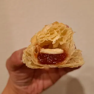 Inside a guava and cheese pastele or pastry