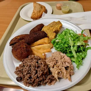 33a. Sampler Platter includes Lechon. Empanada in background was an add-on.