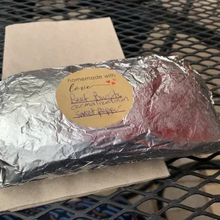 a steak wrapped in foil