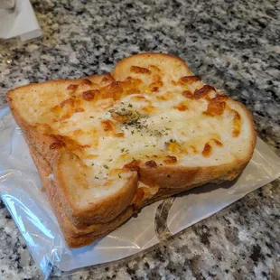 a slice of cheese bread