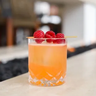 Large cocktail menu. Berries &amp; Blooms