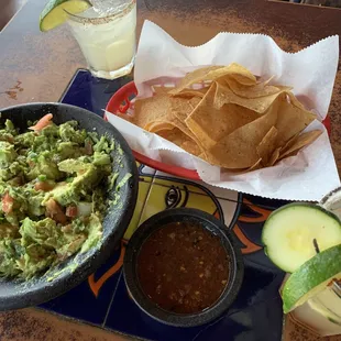 Chips, salsa, house margarita, and fresh tableside guac are always a must!