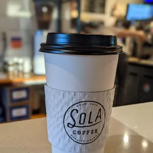 a coffee cup on a counter