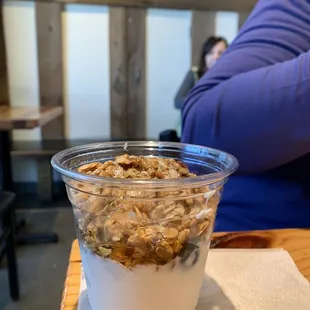 Sola granola parfait with greek yogurt, fruit, and honey