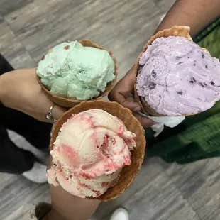 Pistachio (Partially eaten, top left), Huckleberry (Partially eaten, top right), Strawberry Cheesecake (Bottom middle)