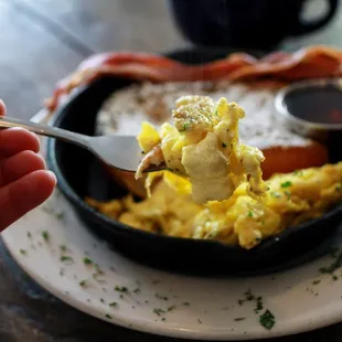 French Toast, scrambled eggs, bacon and syrup