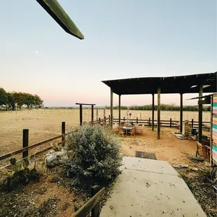 a view of the sun setting in the distance