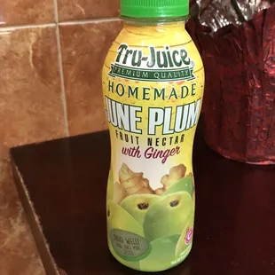 a bottle of juice on a counter