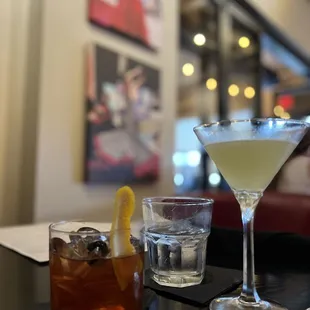 two cocktails on a table