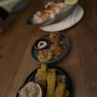 Our apps, polenta frites, cheese puffs, and seafood cocktail (shrimp were really good!)
