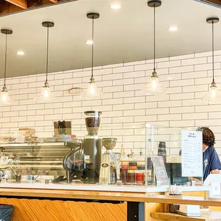 a man working in a coffee shop