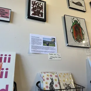 a collection of framed art